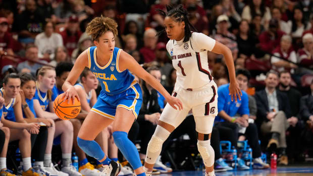 South Carolina Gamecocks guard Zia Cooke defends UCLA Bruins guard Kiki Rice.